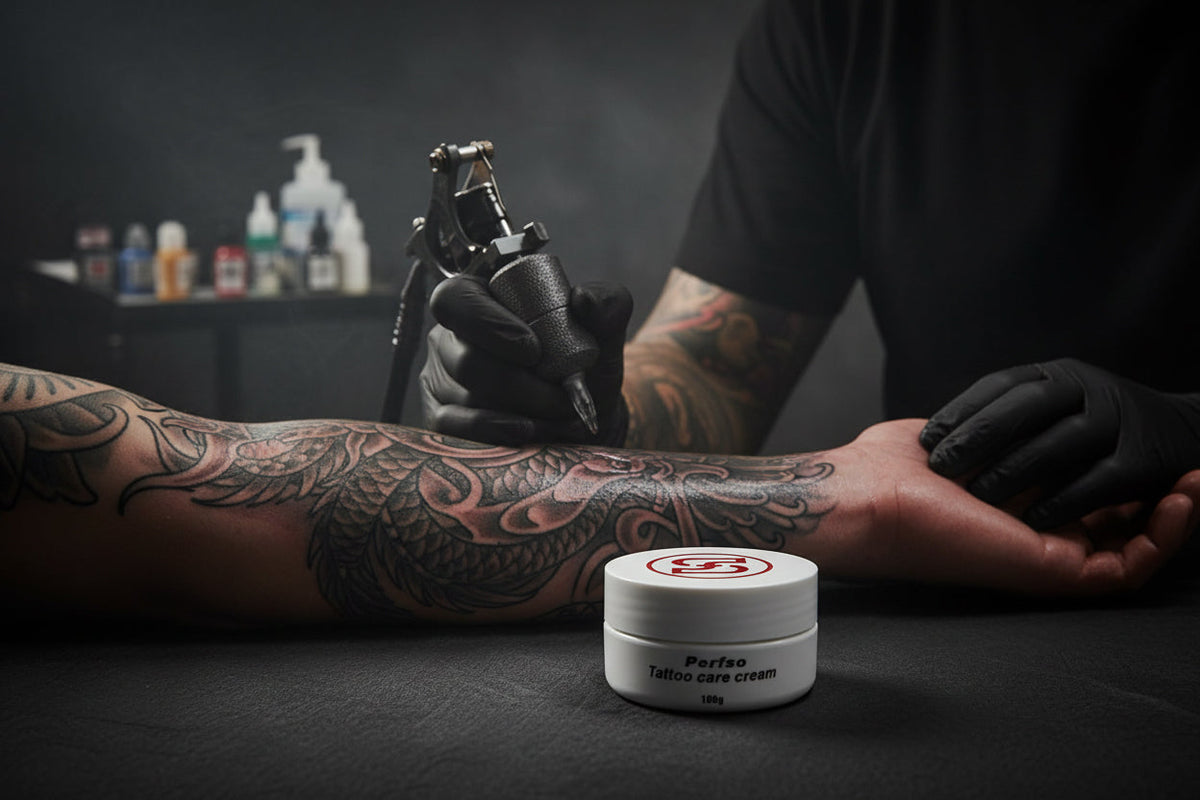 Perfso tattoo numbing cream placed in a professional tattoo studio — safe water-based formula that does not affect ink